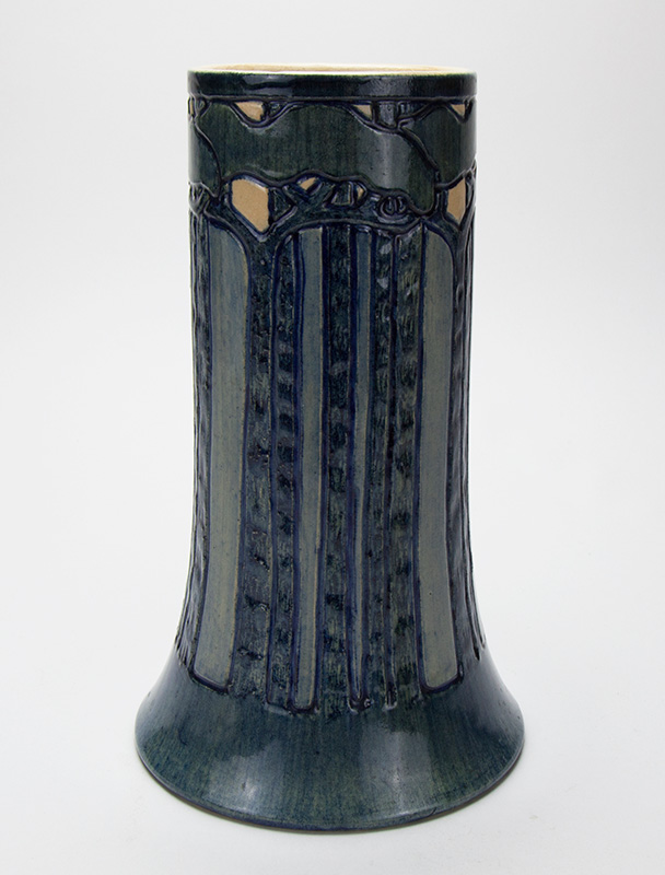 Figure 4. Newcomb College Pottery; Roberta Beverly Kennon (1877–1931), decorator; Vase with pine forest design, 1905. Earthenware with underglaze polychrome ornament. Newcomb Art Museum, 1982.425-C.