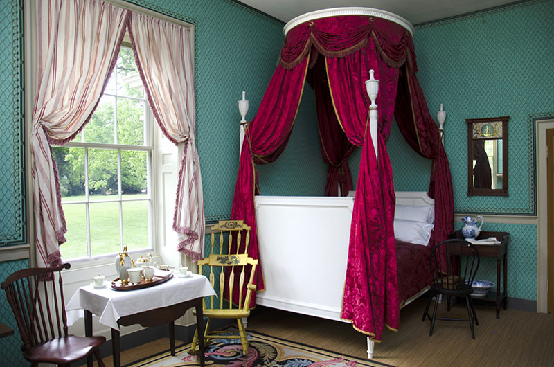 Figure 4. Bed, c. 1790, Paris, France. Painted beechwood, wrought iron, modern damask upholstery. Accession number MF2012.2.1a-i. Courtesy of the Montpelier Foundation.